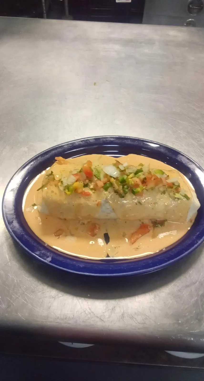 Before: loaded fries shot from overhead with uneven table lighting